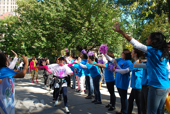 WeLoveU volunteers cheer on Avon Walk participants