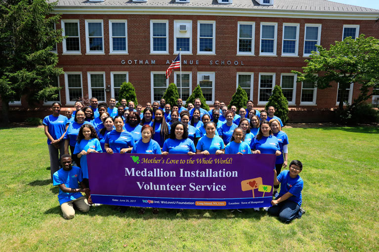 WeLoveU volunteers mark storm drains in Long Island, NY.