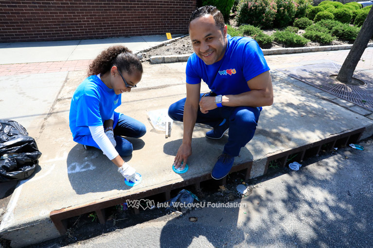WeLoveU volunteers mark storm drains in Long Island, NY.