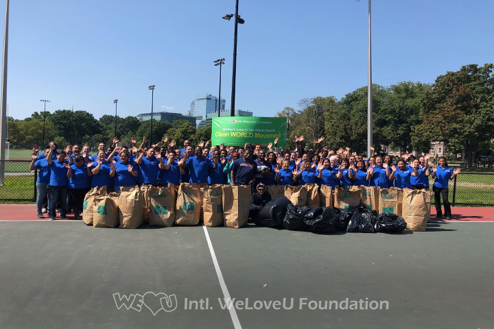 WeLoveU volunteers clean Back Bay Fens in Boston, MA