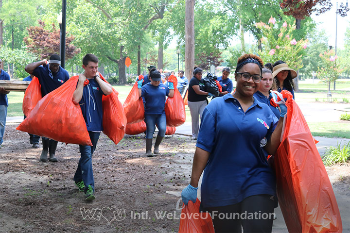 WeLoveU volunteers clean Fayetteville's Cross Creek.