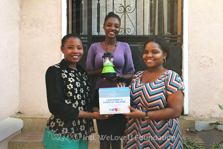 Recipients of The #BrightHaiti solar-powered lanterns