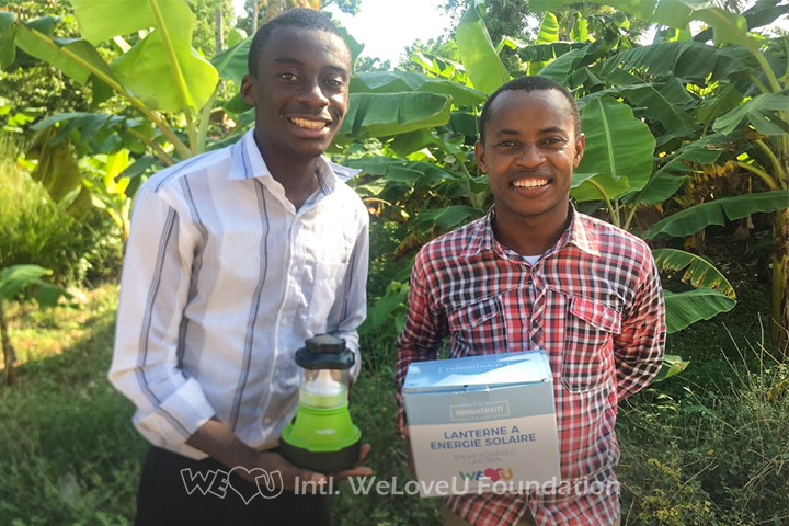 Recipients of The #BrightHaiti solar-powered lanterns