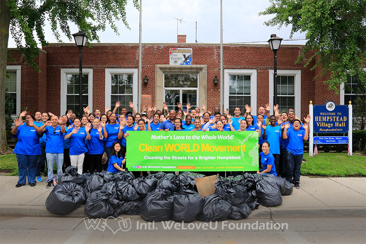 WeLoveU volunteers clean the streets in Hempstead, Long Island, NY.
