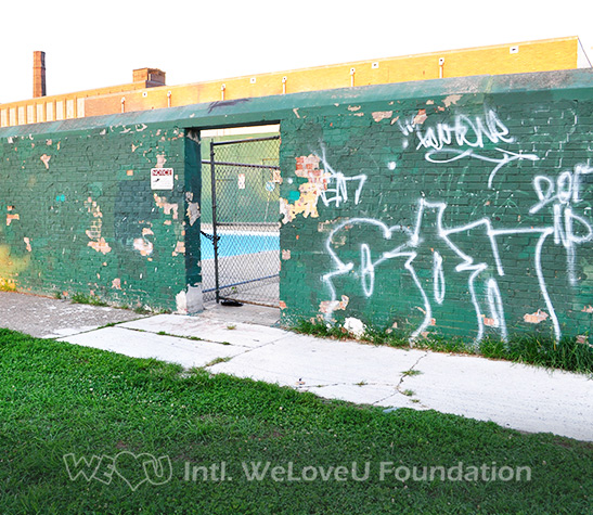 WeLoveU volunteers clean McVeigh Recreation Center and remove graffiti.