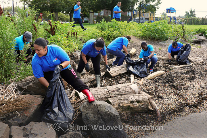 Working together, picking up trash, Newark Bay Shoreline