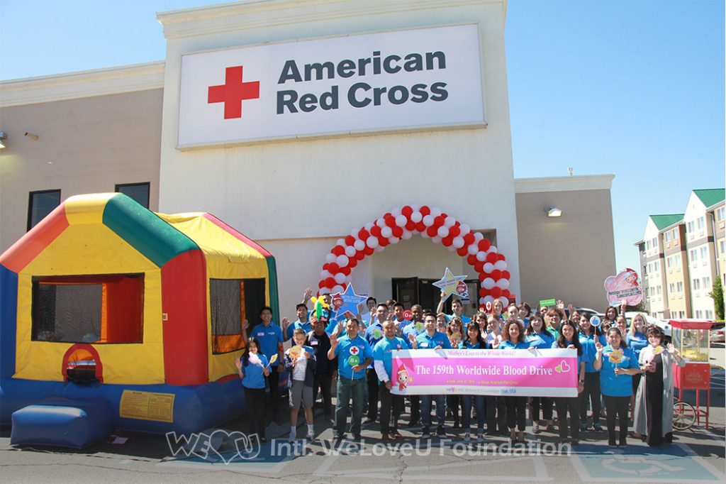 WeLoveU volunteers take a group photo outside of the American Red Cross in Utah