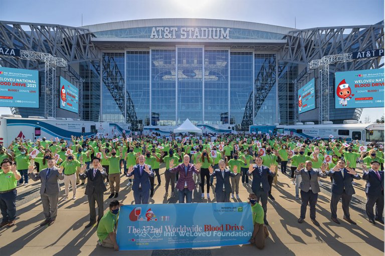 Texas National Blood Drive group photo outside the AT&T Stadium