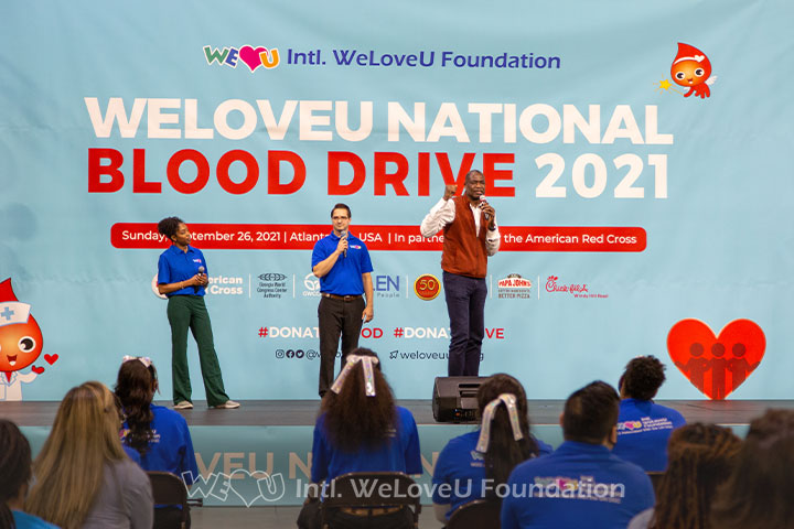 Dikembe Mutombo speaks on stage at the Intl. WeLoveU Foundation's blood drive in Atlanta, GA